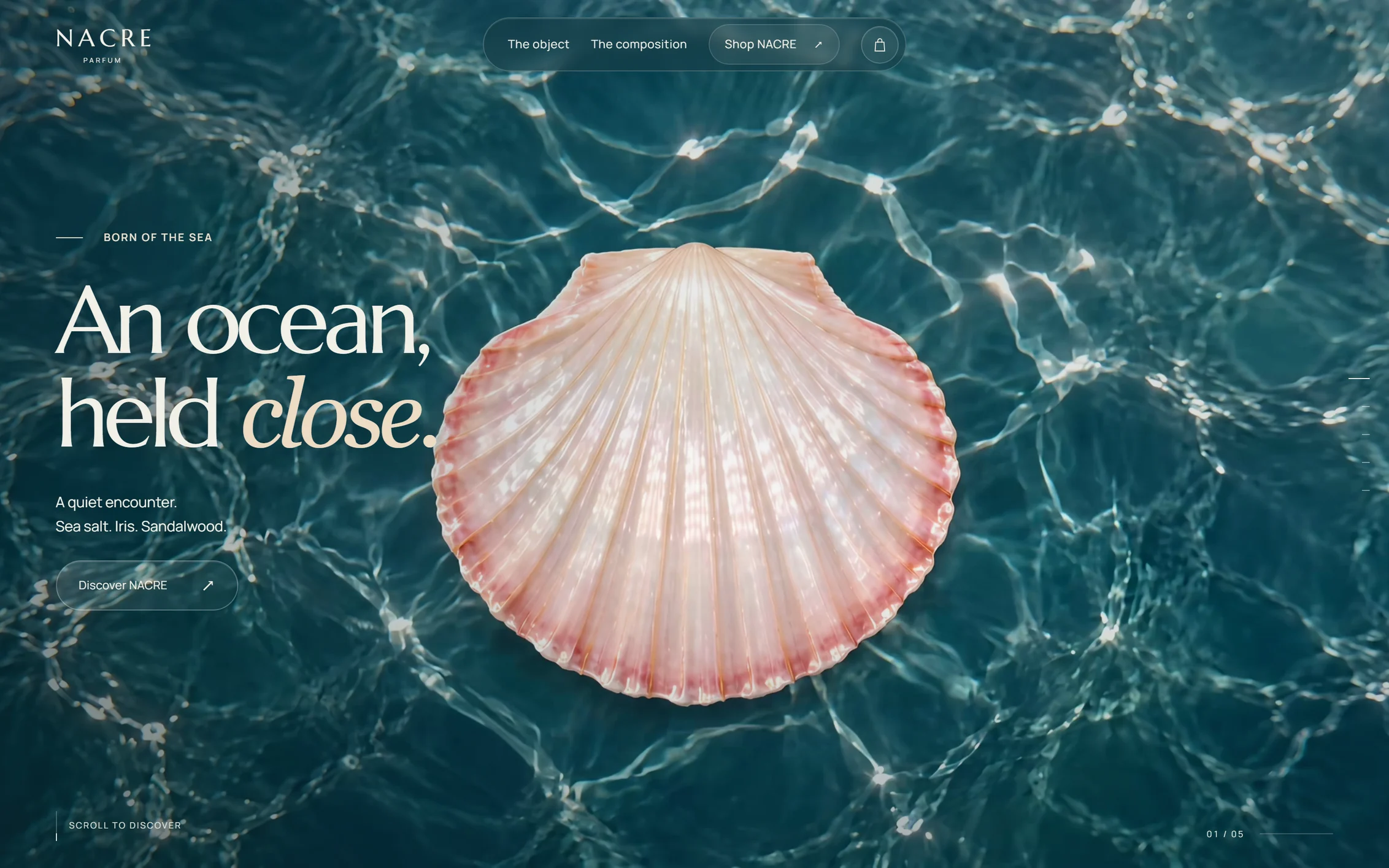 NACRE — a pearl-capped perfume bottle beneath the sea, held inside a glass bubble